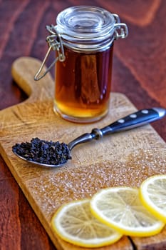 ingredients for tea, lemon, brown sugar, honey