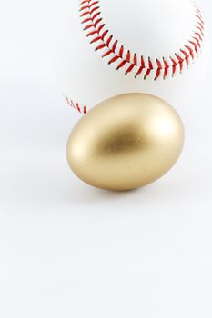 Baseball with gold nest egg shows successful business investment