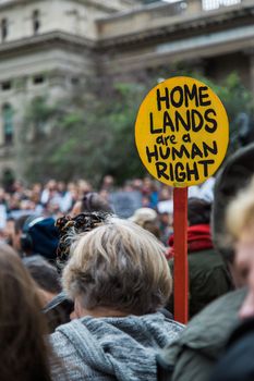 Protesters rally against the torture and detention of indigenous children in the Northern Territory. The rally was held outside the State Library.