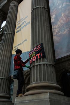 Protesters rally against the torture and detention of indigenous children in the Northern Territory. The rally was held outside the State Library.