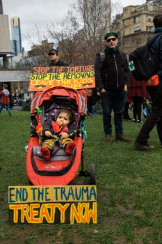 Protesters rally against the torture and detention of indigenous children in the Northern Territory. The rally was held outside the State Library.