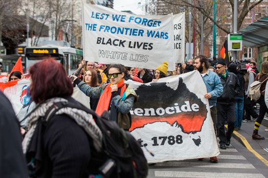 Protesters rally against the torture and detention of indigenous children in the Northern Territory. The rally was held outside the State Library.