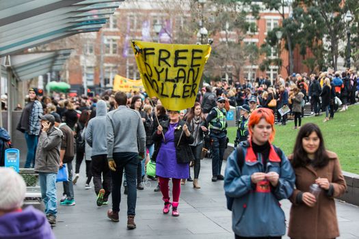 Protesters rally against the torture and detention of indigenous children in the Northern Territory. The rally was held outside the State Library.