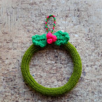 Diy Christmas wreath for decoration the door on Xmas holiday, a traditional festive in winter,  knit in round to make wreaths for christmas decoration