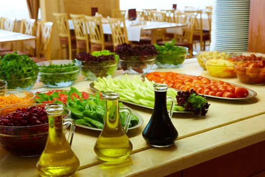 Selection of salads at a buffet bar in a luxury hotel restaurant.