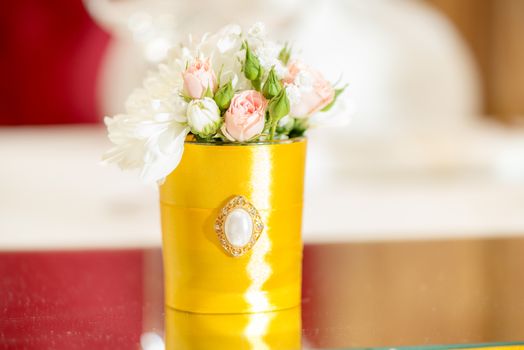 Close-up of a wedding table decoration with flowers