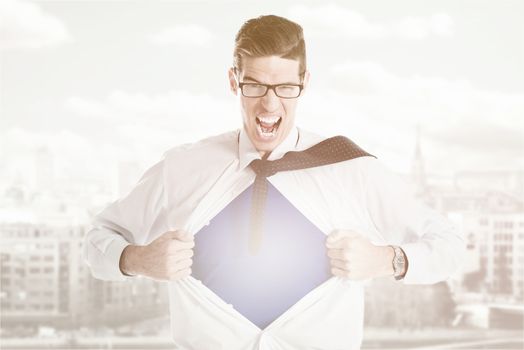 Angry businessman ripping open his shirt and exposing a Superhero red costume underneath. The man is wearing glasses and looking at camera.