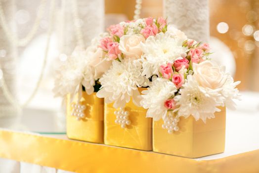 Close-up of a wedding table decoration with flowers