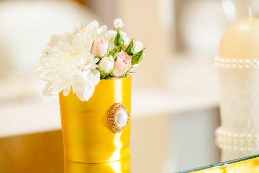 Close-up of a wedding table decoration with flowers