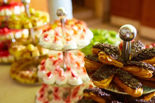 Dessert table for a party. akes and sweetness. Shallow dof