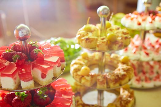 Dessert table for a party. akes and sweetness. Shallow dof