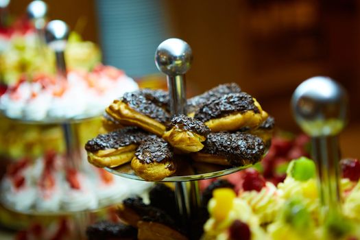 Dessert table for a party. akes and sweetness. Shallow dof