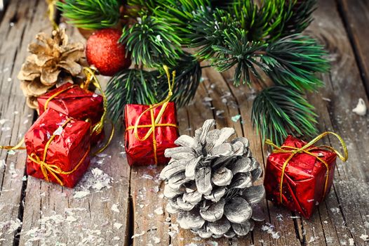 Boxes with Christmas gifts,fir tree and pine cone