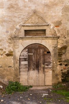 Detail of the architecture in Banska Stiavnica, former mining city in Slovakia. Historic frame of a gate. City is part of a Unesco World Heritage Site.