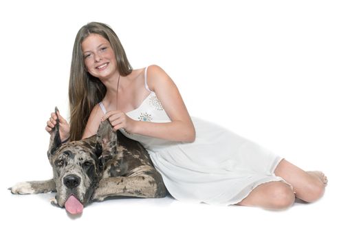 Great Dane and child in front of white background