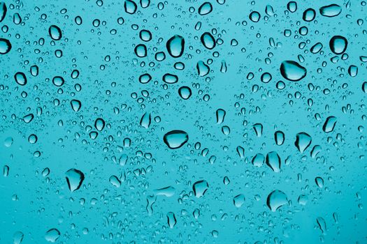 rain drops on a window glass. Shallow DOF