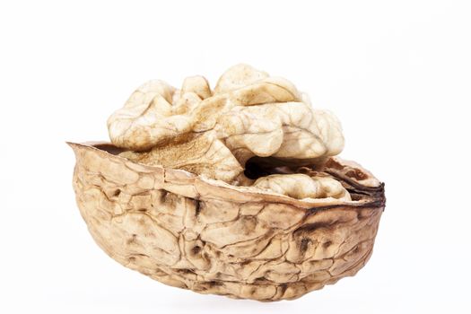 Single  walnut with half nutshell  isolated on white background, close up
