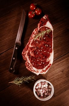 Entrecote steak of beef on a wooden board, studio shoot