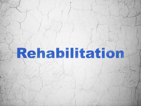 Healthcare concept: Blue Rehabilitation on textured concrete wall background