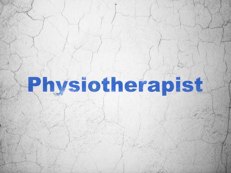 Medicine concept: Blue Physiotherapist on textured concrete wall background
