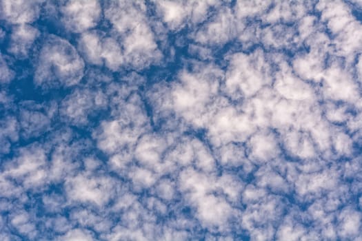 blue sky background with a tiny clouds