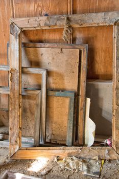 Old dusty wooden frames for paintings