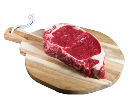 Entrecote steak of beef on a wooden board, studio shoot