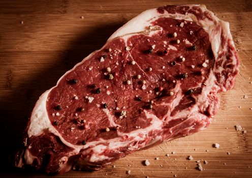 Entrecote steak of beef on a wooden board, studio shoot
