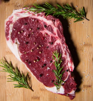 Entrecote steak of beef on a wooden board, studio shoot