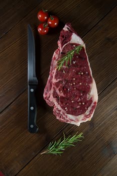 Entrecote steak of beef on a wooden board, studio shoot
