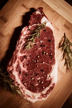 Entrecote steak of beef on a wooden board, studio shoot