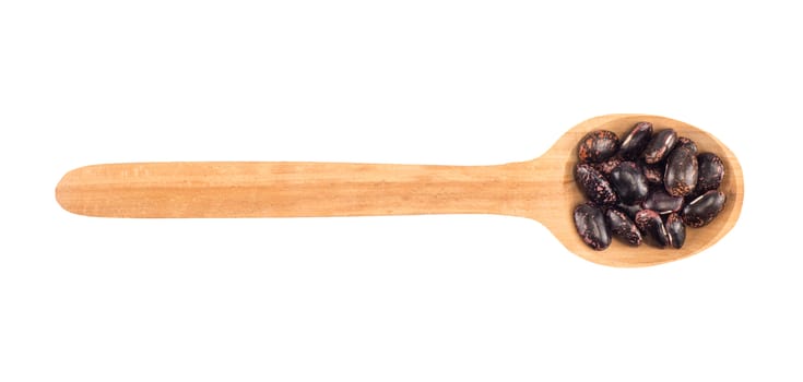 kidney beans on a wooden spoon isolated on white background