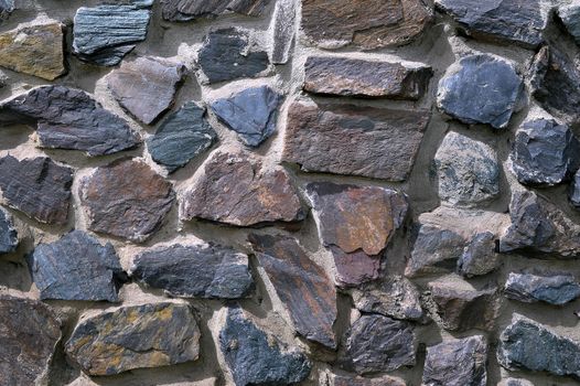 The texture in the form of a wall of colored quartz.
