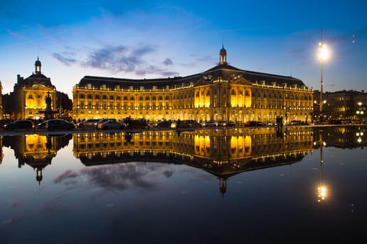 Bordeaux, France, Illuminated Reflection In Water At Place De La Bourse Against Sky