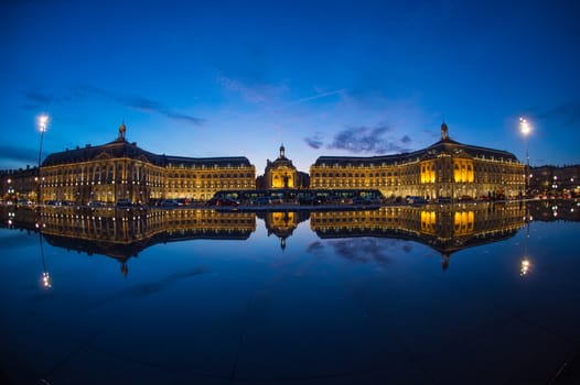 Bordeaux, France, Illuminated Reflection In Water At Place De La Bourse Against Sky