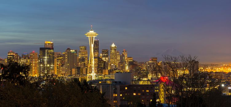 Seattle Washington City Skyline with Mount Rainier during evening panorama