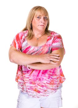 Skeptical or angry mature transgender woman on white background