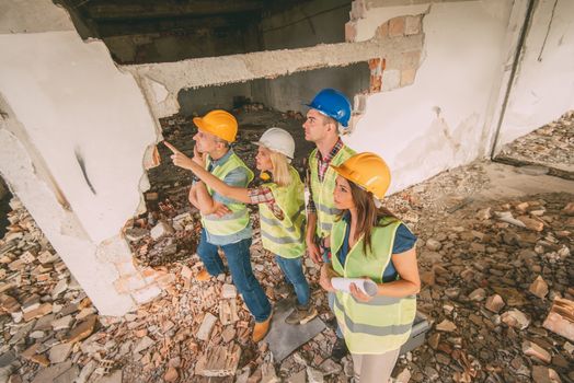 Four construction architects in building damaged in the disaster.