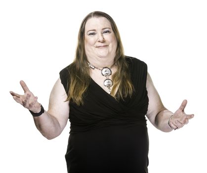 Transgender woman in black dress on white background with hands outstretched