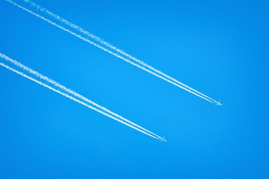 Two Jet Airplanes in the Blue Sky