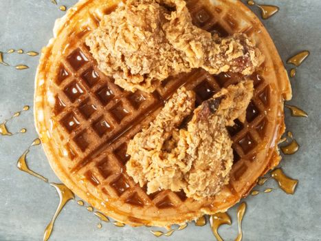 close up of rustic southern american comfort food chicken waffle