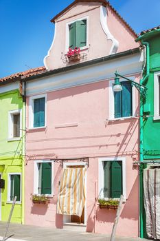 Colorful beautiful pink house in Venice, Italy