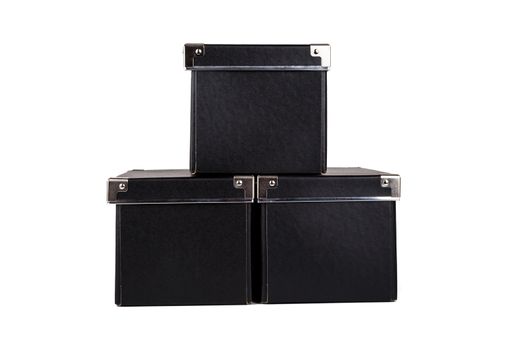 Close up view of three black cardboard box isolated on white background.