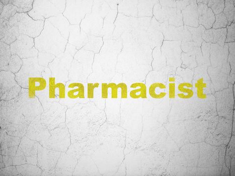 Health concept: Yellow Pharmacist on textured concrete wall background