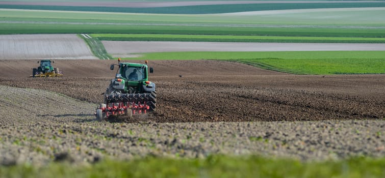 Tractor plowing the fields Champagne France Europe