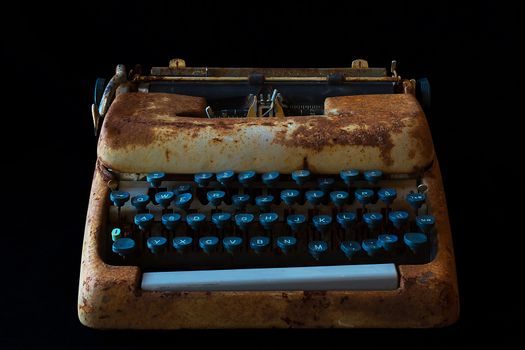 Typewriter, Waiting for Inspiration. Vintage Rusty Typewriter Machine. Journalist Equipment. Typewriter Isolated on Black Background.