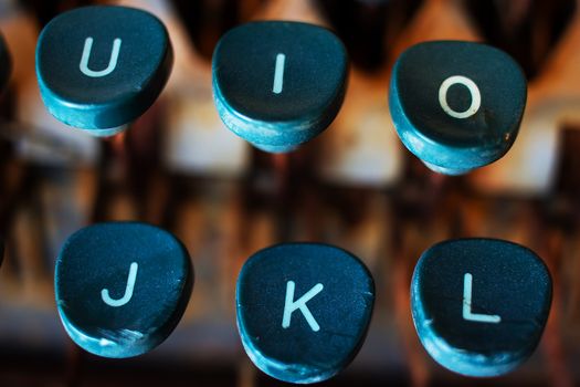 Typewriter Keys Close Up. Keyboard Detail of a Vintage Rusty Typewriter. Typewriter Buttons. Selective Focus and Shallow Depth of Field.