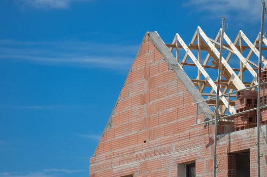 Building, House under construction and crane, France