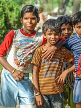 Amroha, Uttar Pradesh, INDIA - 2011: Indian children of slams smilimg boys