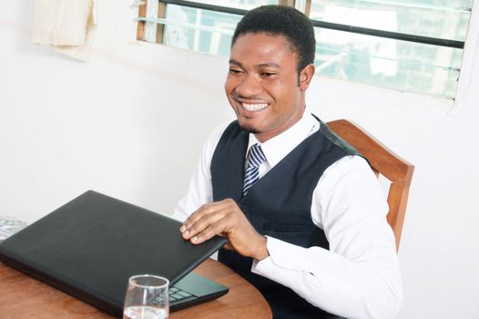 Sminling, the businessman finds his office this morning in joy